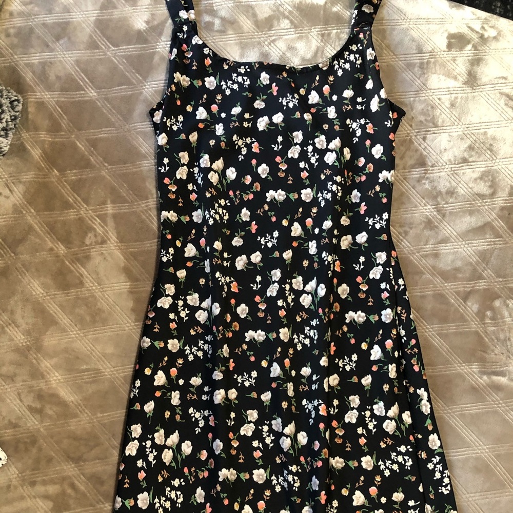 Long fitted Black dress with floral detail